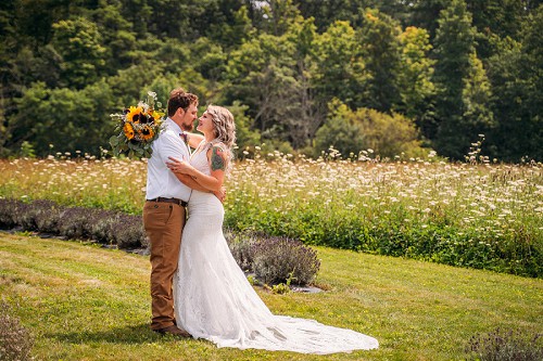 Bride and groom in lavender field