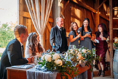 couple laughing during reception at kehoe and kin