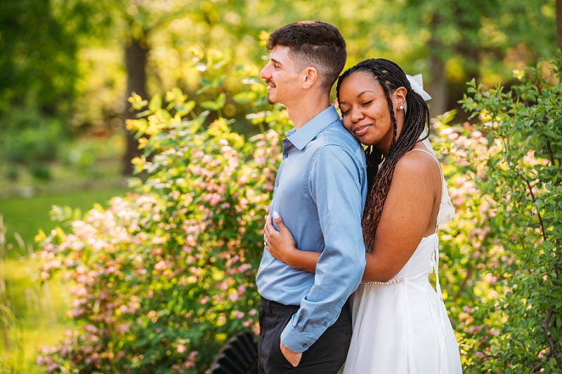 bride resting head on grooms shoulder 