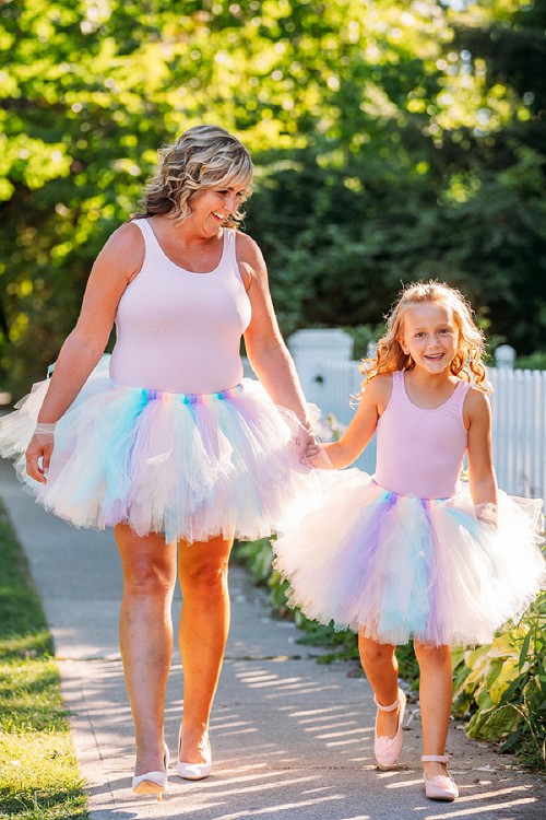 mom and daughter holding hands