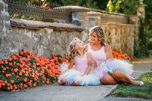 tutu shoot while surrounded by flowers