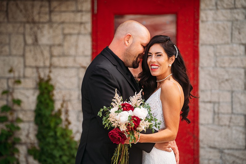 wainfleet engagement with couple looking at camera