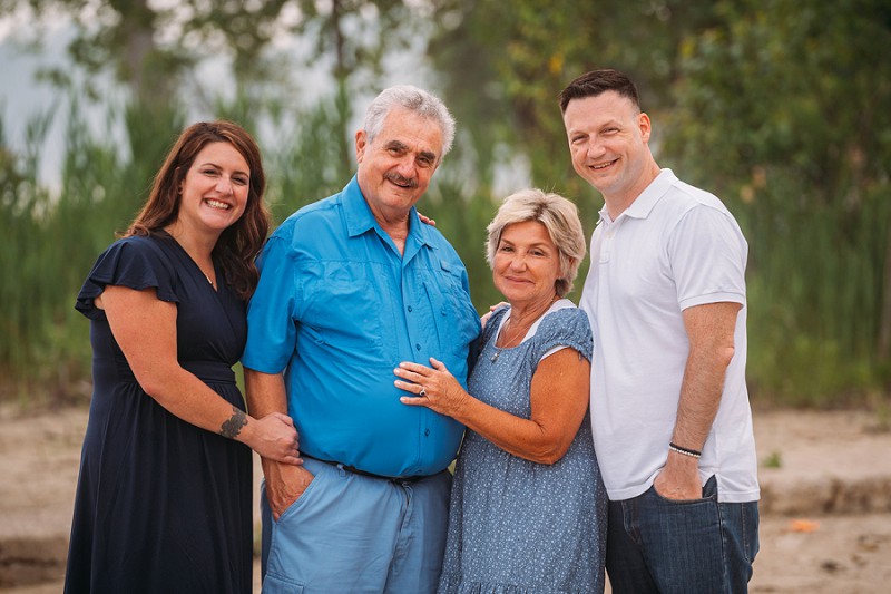 family sitting and smiling