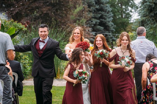 wedding party walking down isle