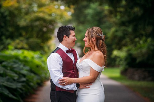 bride and groom smiling