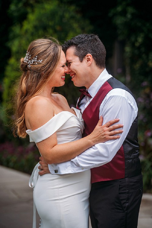 couple smiling and holding each other