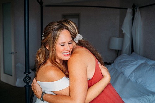 bride hugging friend