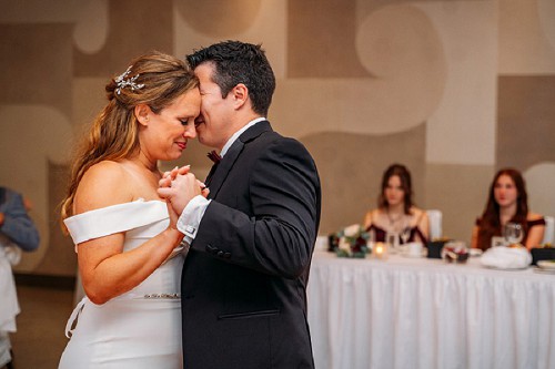 bride and groom dancing