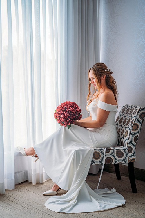 bridal portrait by window
