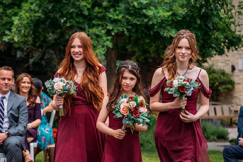 flower girls walking down isle