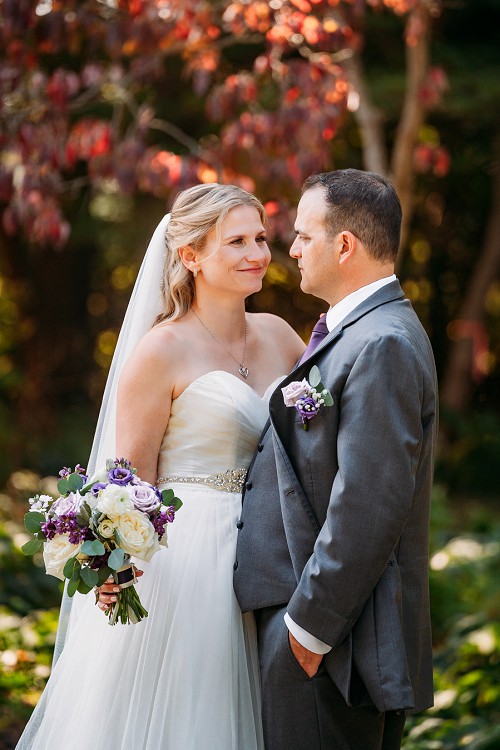 bride and groom smiling