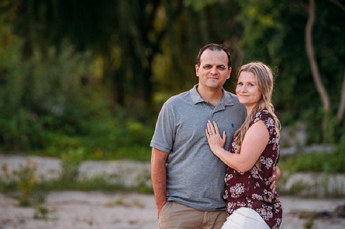 portrait of couple with trees in background