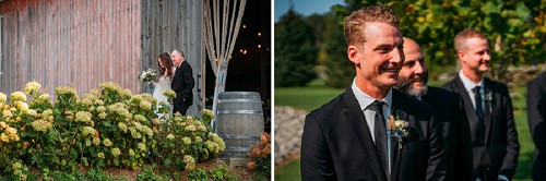 groom smiling at bride walking down aisle