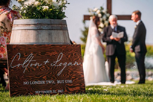wedding ceremony with sign in focus