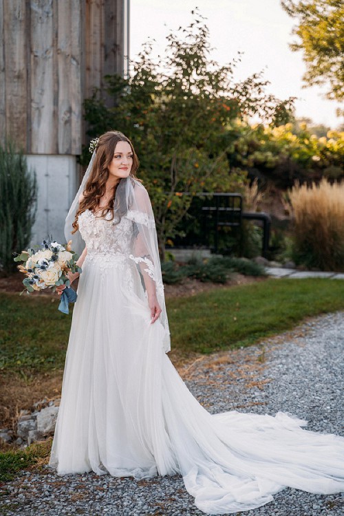 bride holding her dress