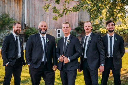 groomsmen smiling