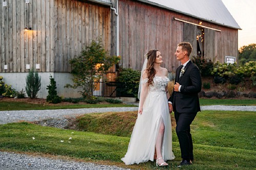 bride and groom posing at kehoe and kin