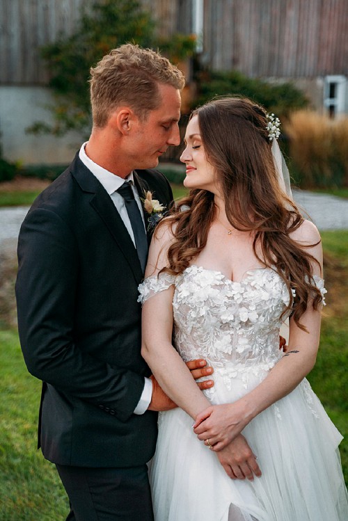 romantic moment between bride and groom