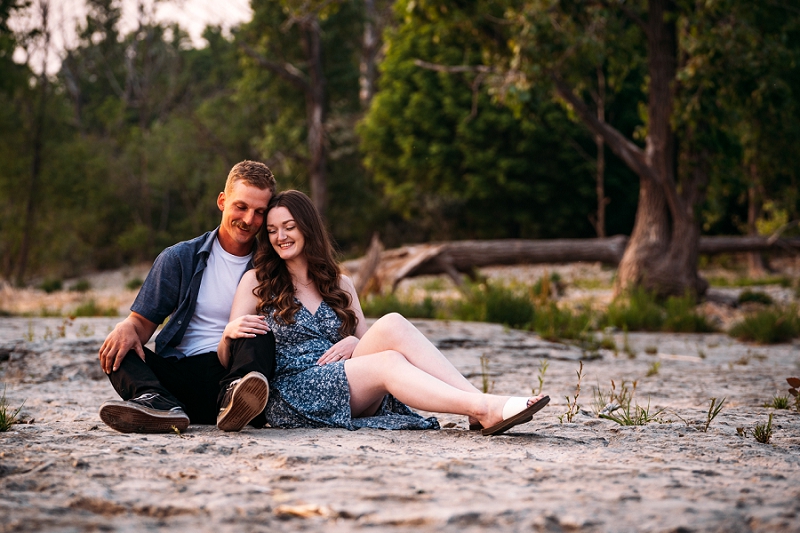 couple sitting together on the beach