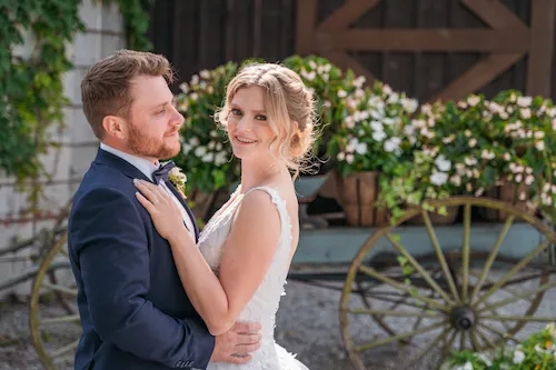 Bride and groom portraits in the gardens at Maple Meadows Farm wedding venue