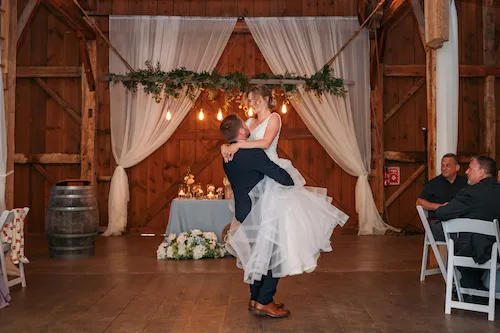 Bride and groom dancing in the barn at Maple Meadows