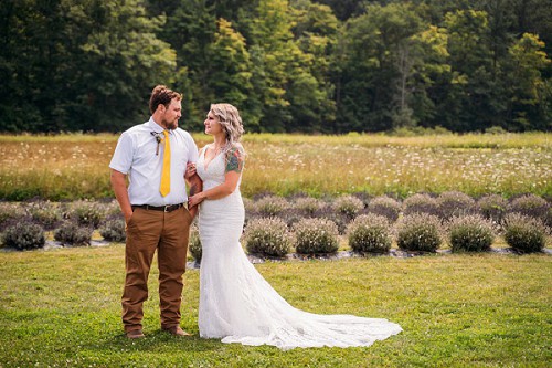 bride and groom in lavender field