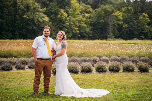 bride and groom smiling