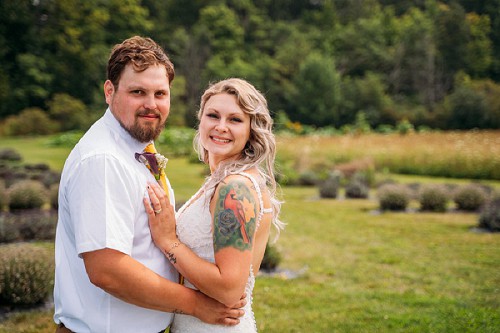 bride and groom holding each other