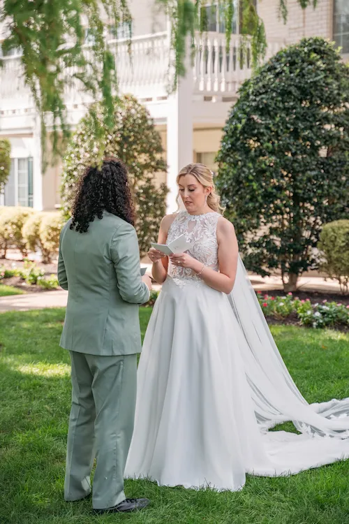 the madison hotel wedding. Bride reading vows