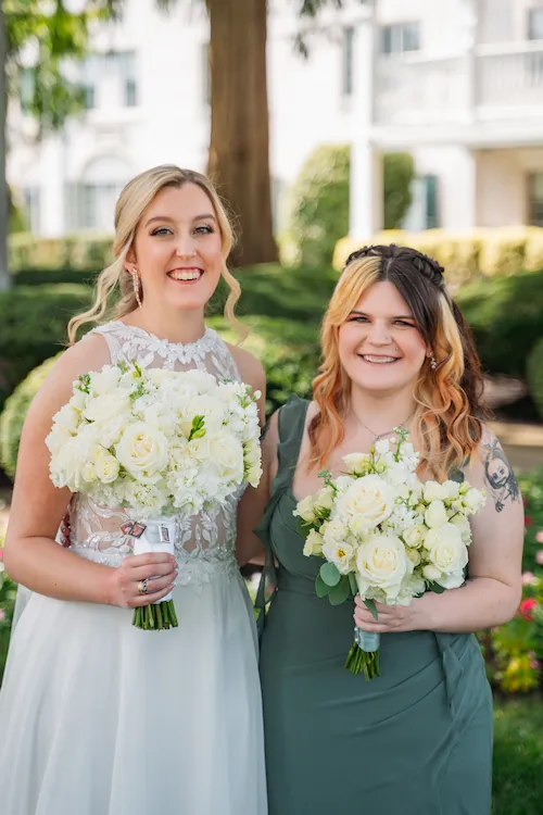 bride and maid of honor laughing