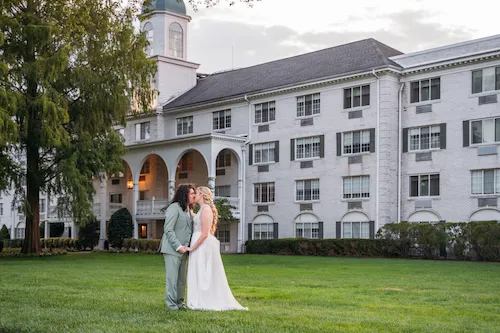 bride and groom kissing during sunset at the madison hotel, new jersey