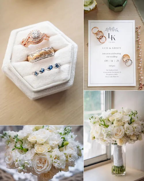 Close-up of wedding rings with white flowers on prep table