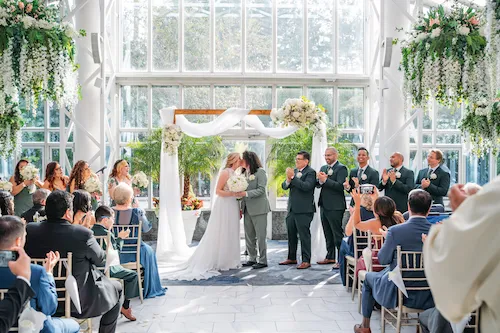 bride and groom first kiss