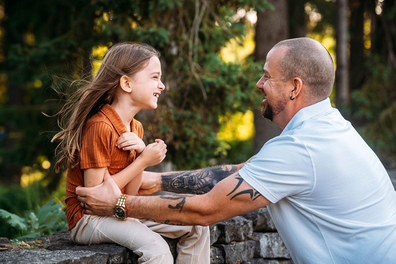 father making child laugh