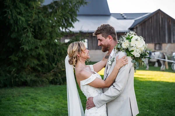 bride and groom smiling at each other at sue ann staff estate winery