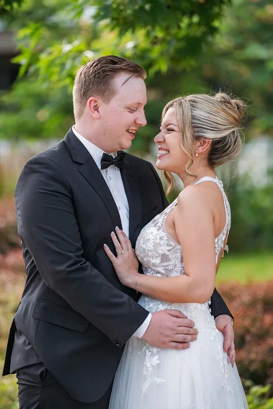bride and groom at pillar and post wedding gardens in NOTL